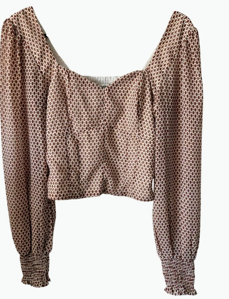 Long sleeve knitted top with a great neck. talla S